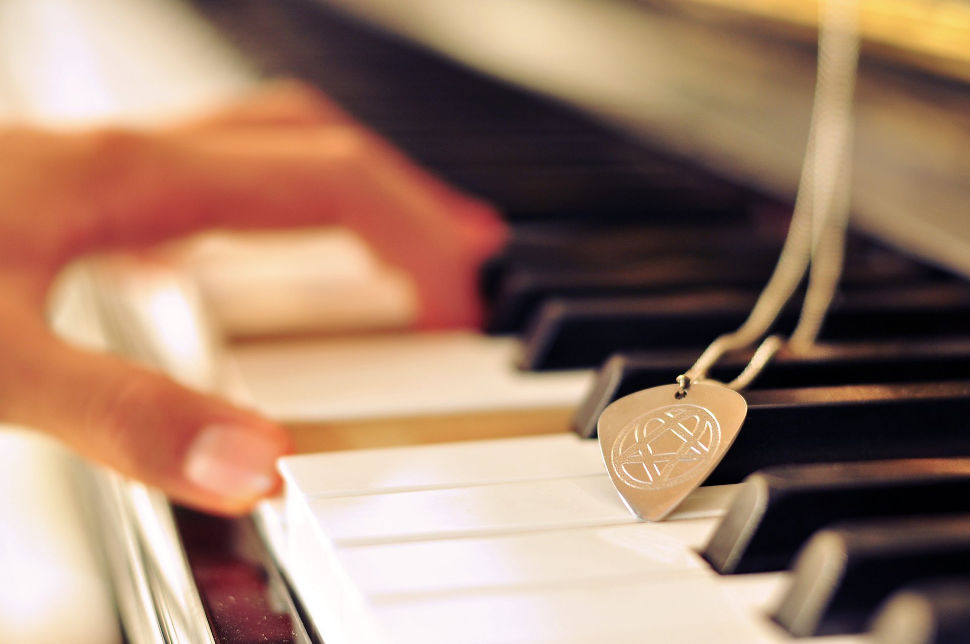 keys chord hand sign medallion