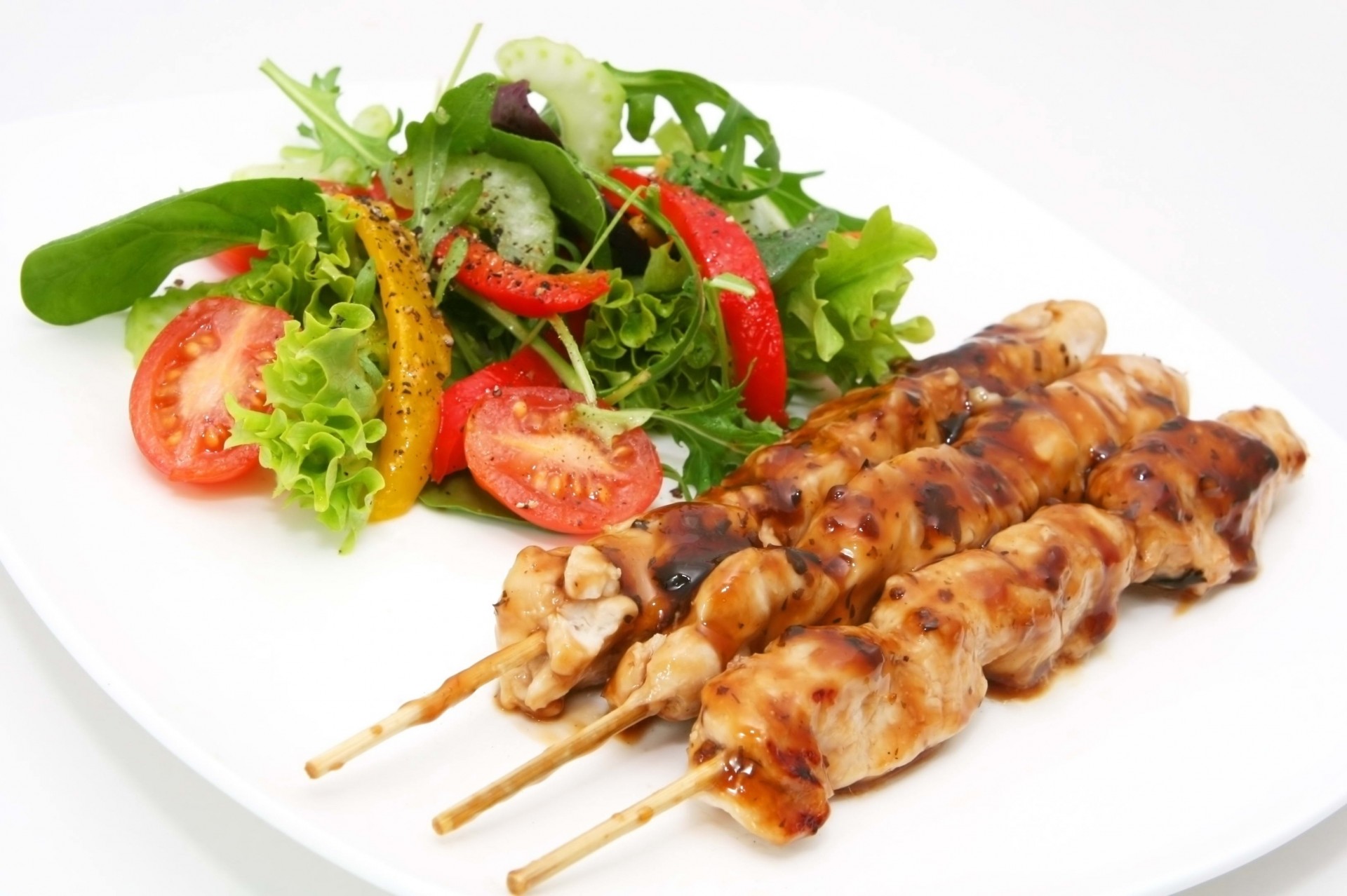 kebabs white background plate green salad