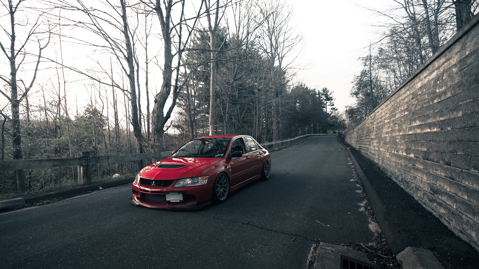 mitsubishi lancer evo red mitsubishi lancer tuning road park wall