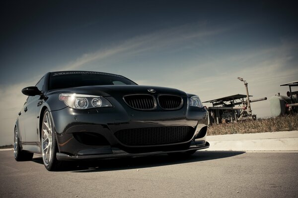 Black bmw on the highway view from below