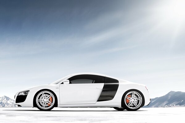 Audi r8 v10 supercar in snowy mountains