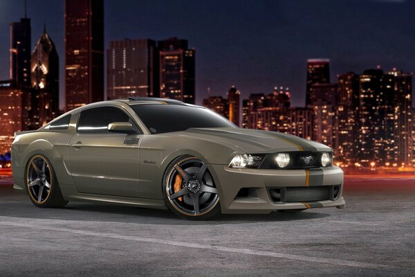 Ford Mustang GT 5. 0 on the background of the metropolis
