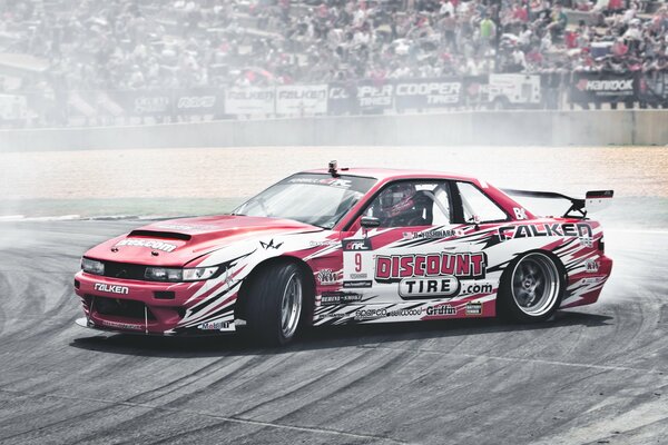 Nissan silvia s13 drifts with smoke at competitions