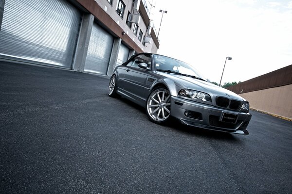 Silver BMW convertible on asphalt