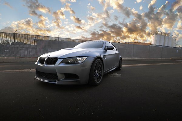 Silver bmw m3 against the sky