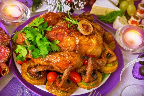 Festive dinner. Baked chicken with mushrooms in sauce