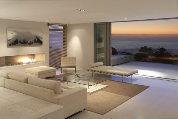 Interior in white tones with a terrace and sea view