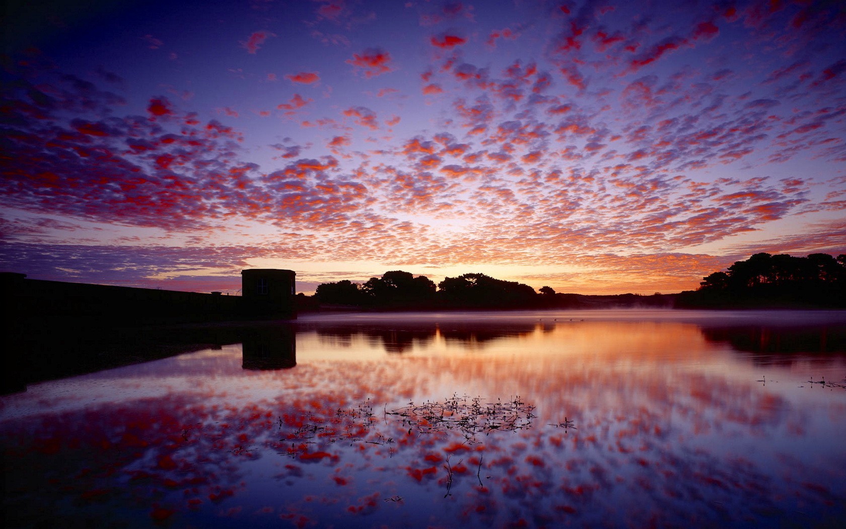 puesta de sol nubes reflexión