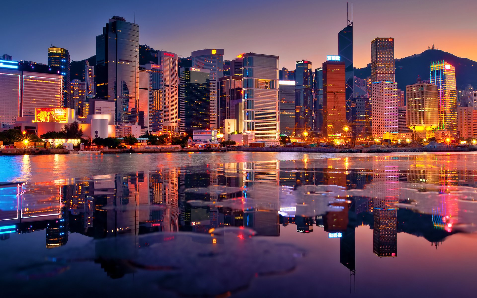 hong kong soirée baie gratte-ciel coucher de soleil lumières bâtiments