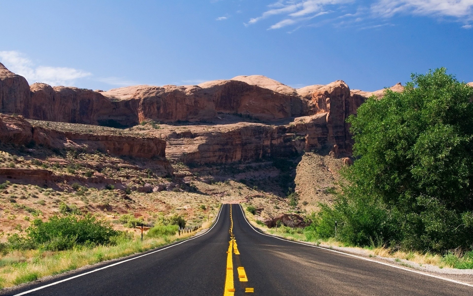 road in the mountains road clouds trees mountains the sky