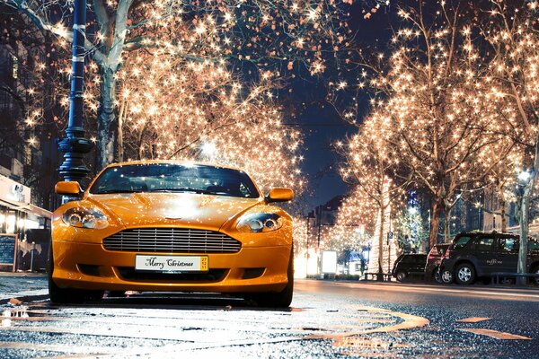 Shiny aston martin bright lights city