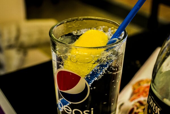 Cold lemonade in a glass of pepsi