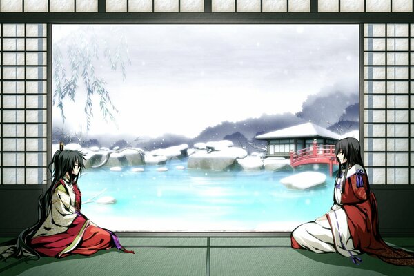 Two girls in a kimono on the background of a lake and a bridge