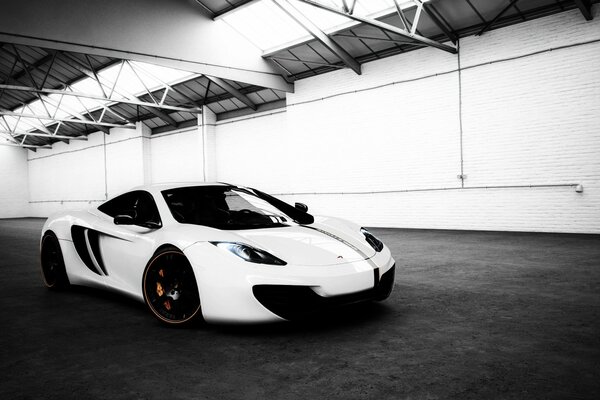 McLaren s black and white background in the hangar