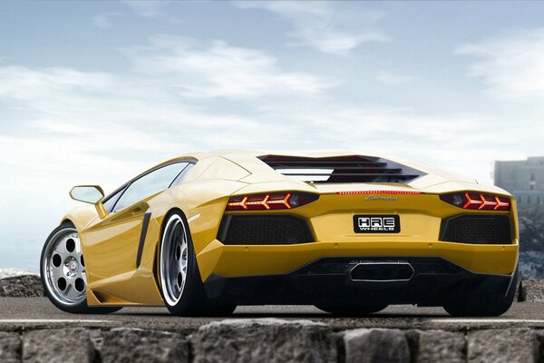 Beautiful yellow Lamborghini Aventador sports car with shiny wheels