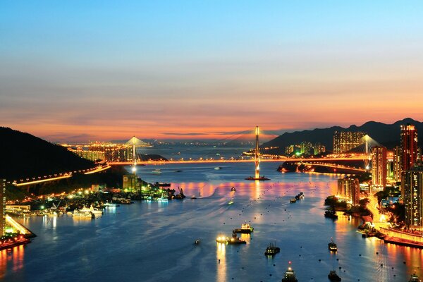 River through the city in lights