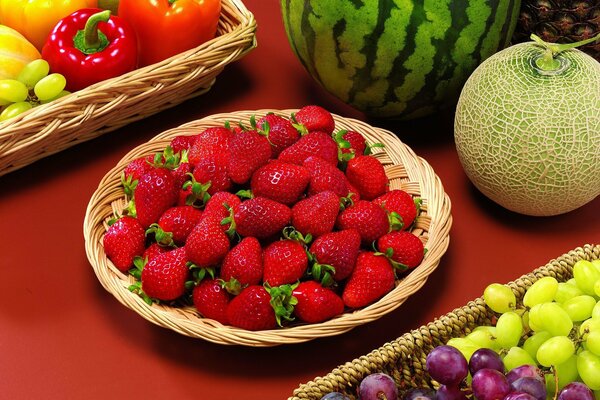 Table with fresh fruits, berries and vegetables