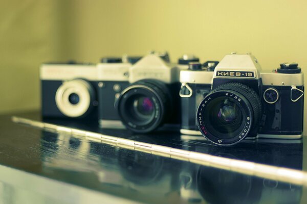 Smena-8 camera, lens mount, reflection on the table