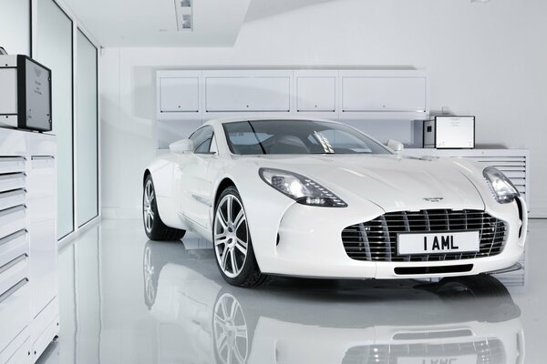 White aston martin one-77 with reflection