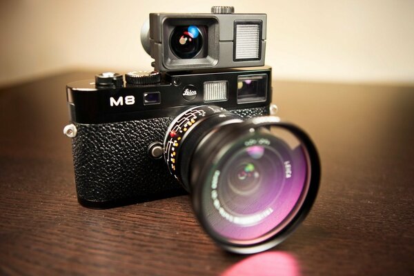 The camera of the past centuries on the surface of the table