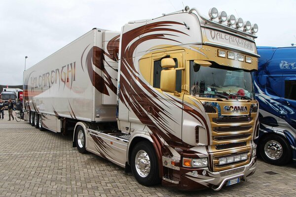 Tuned scania truck with golden cab