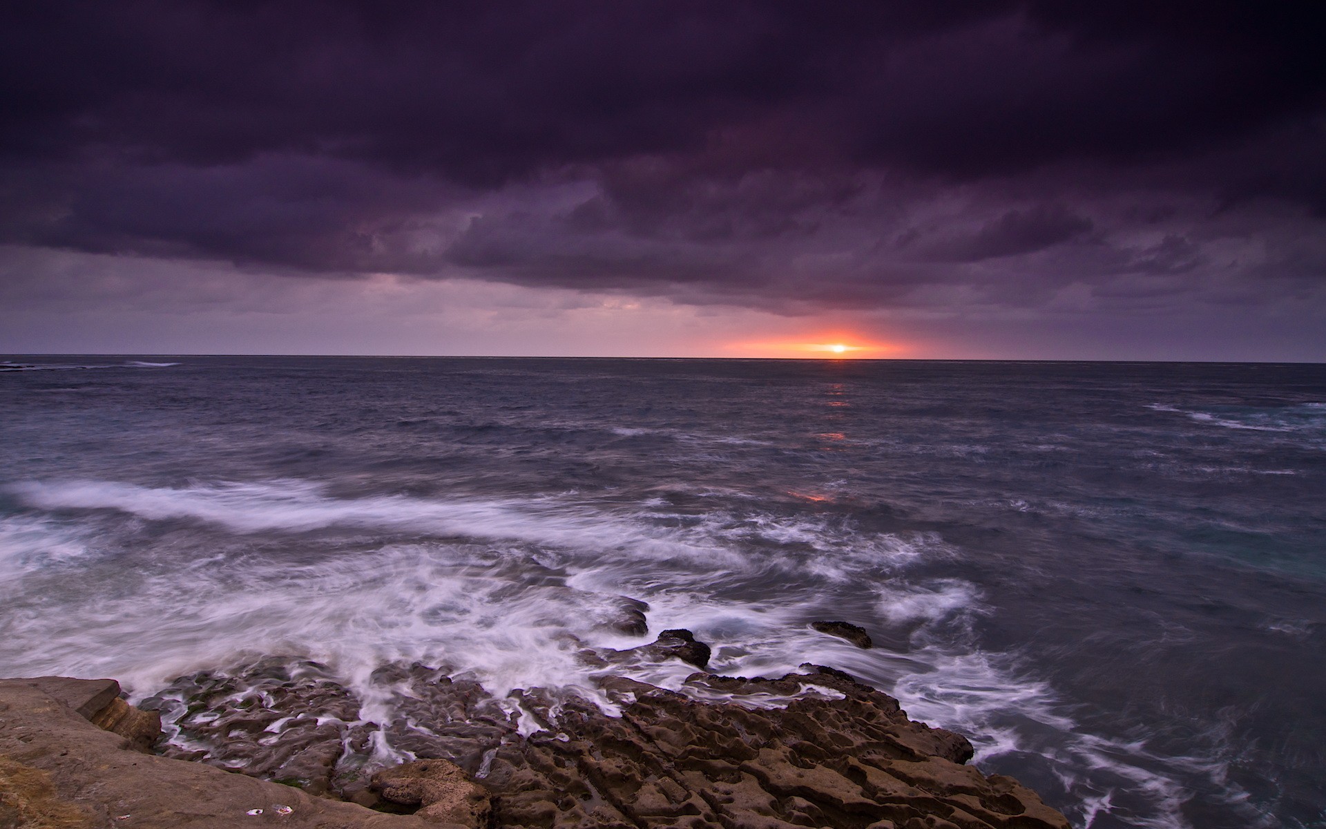 puesta de sol mar olas