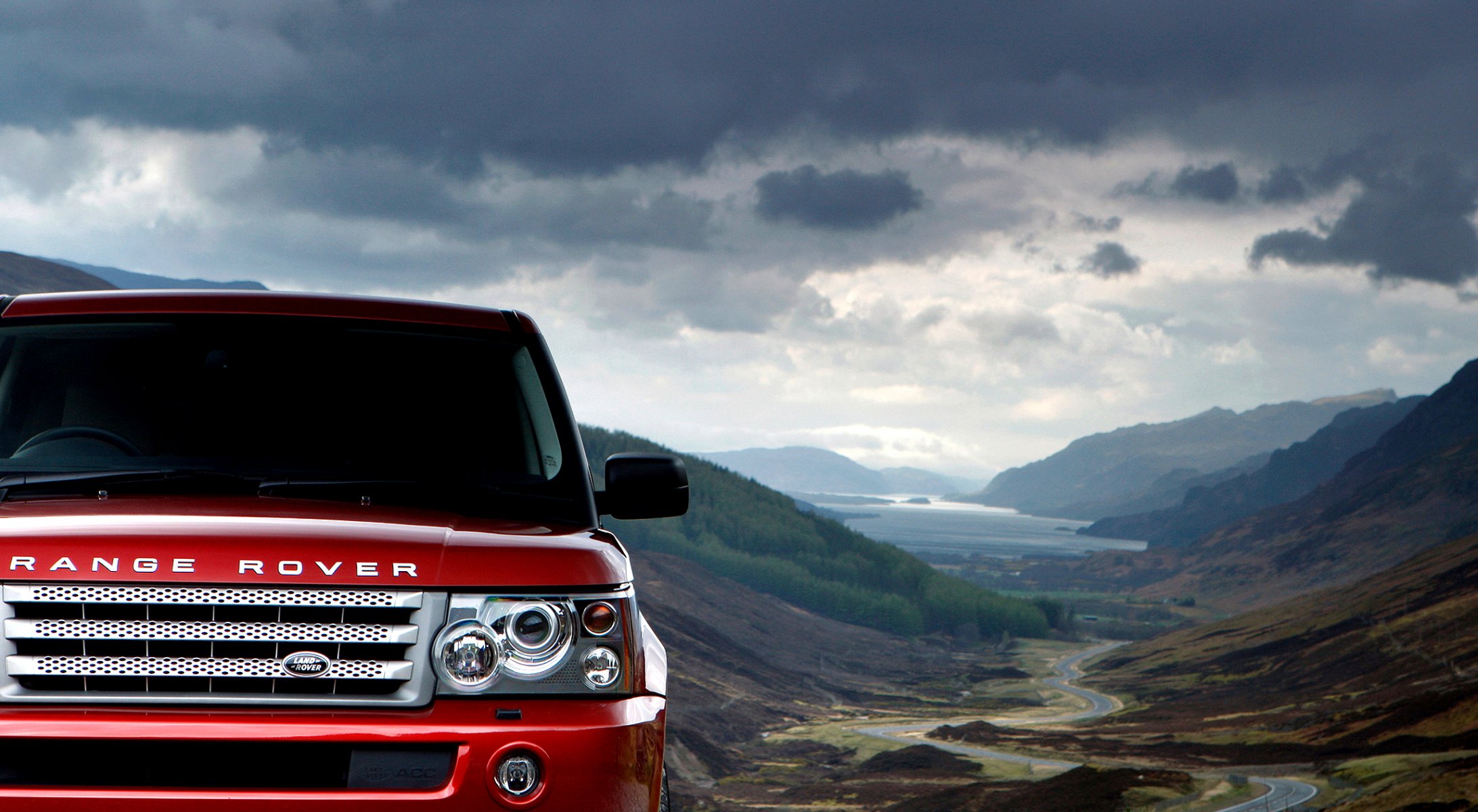 rojo land rover range rover sport montañas cielo nubes