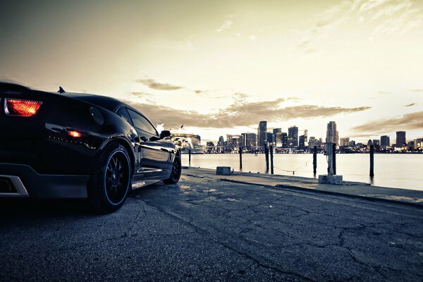 Evening sunset on chevralet camaro