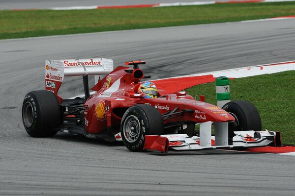 El piloto de Fernando Alonso en un coche de fórmula 1