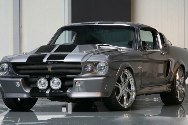 Silver ford mustang indoors