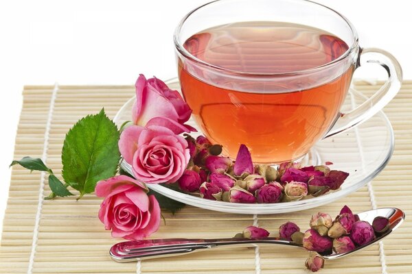 Mug of tea with rosebuds