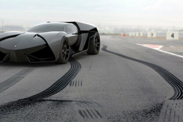 A black lamborghini ankonian is parked on the track