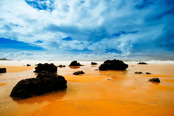 Rocky beach under blue sky