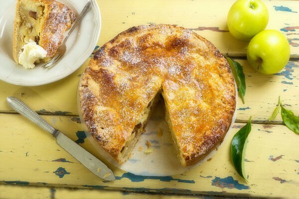 Apple pie on a wooden table