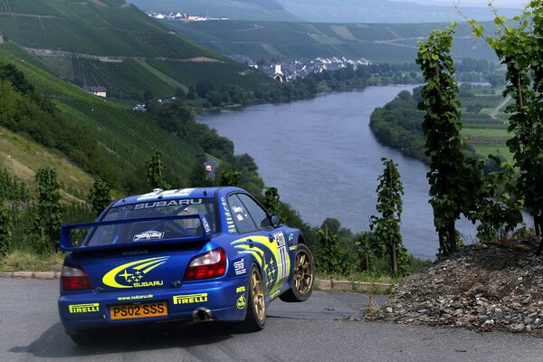 Subaru impreza wrx on the background of the river