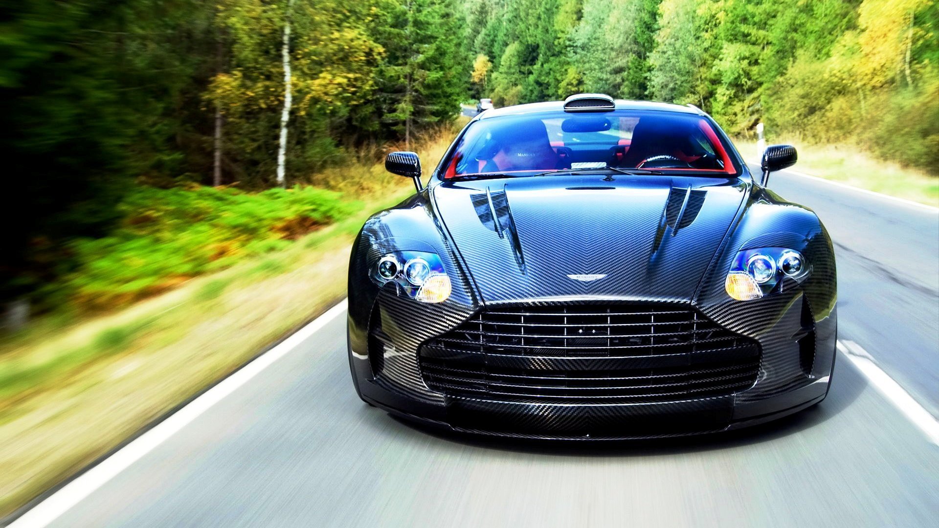 aston martin db9 o dbs carbono