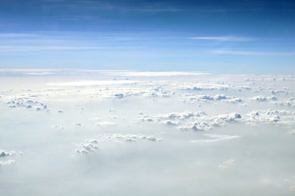 Flying above the clouds in the sky