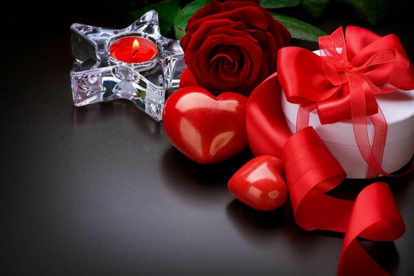 Romantic image : candle, rose, gift box