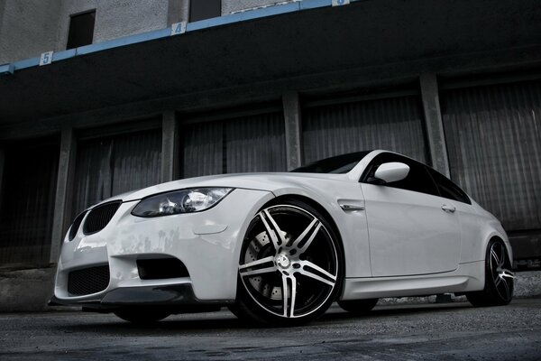 White BMW in a beautiful perspective with cool wheels