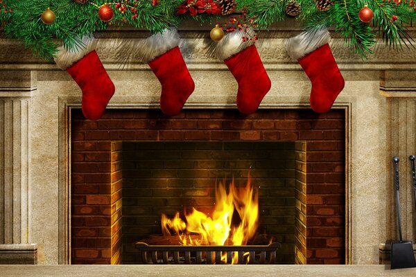 New Year s image of a blazing fireplace with red socks for gifts