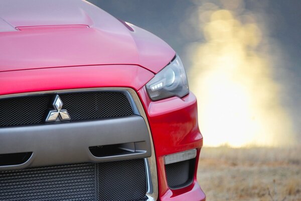 Mitsubishi red at sunset