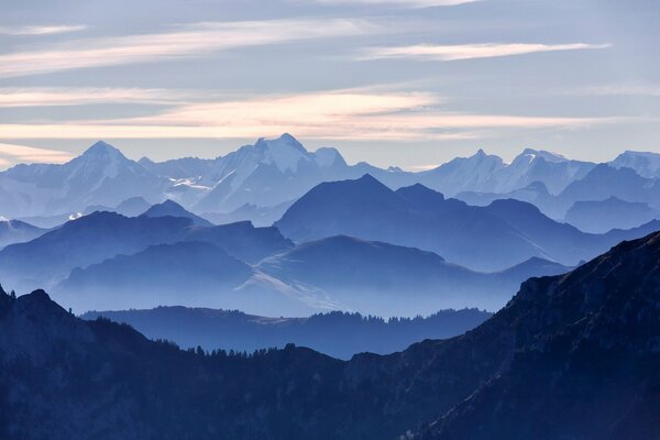 Misty mountains against the sky