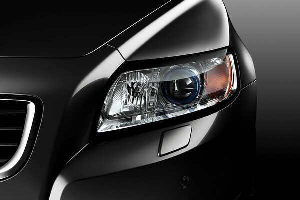 The headlight is very similar to the eye of a black car