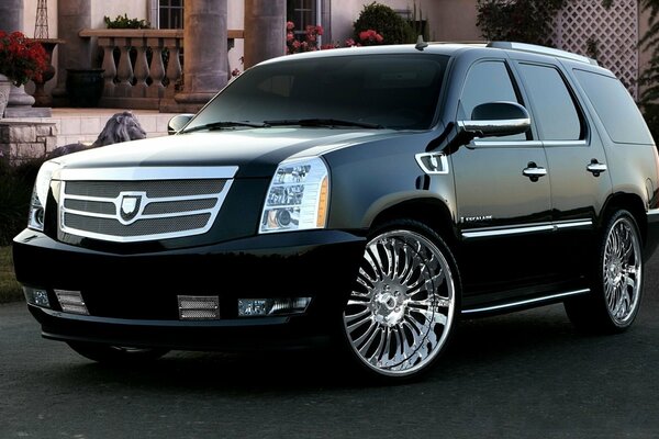 Black Cadillac with tinted windows