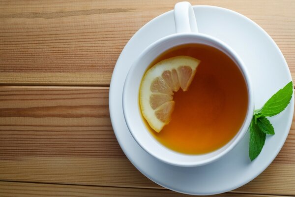 Cup of tea with lemon and mint