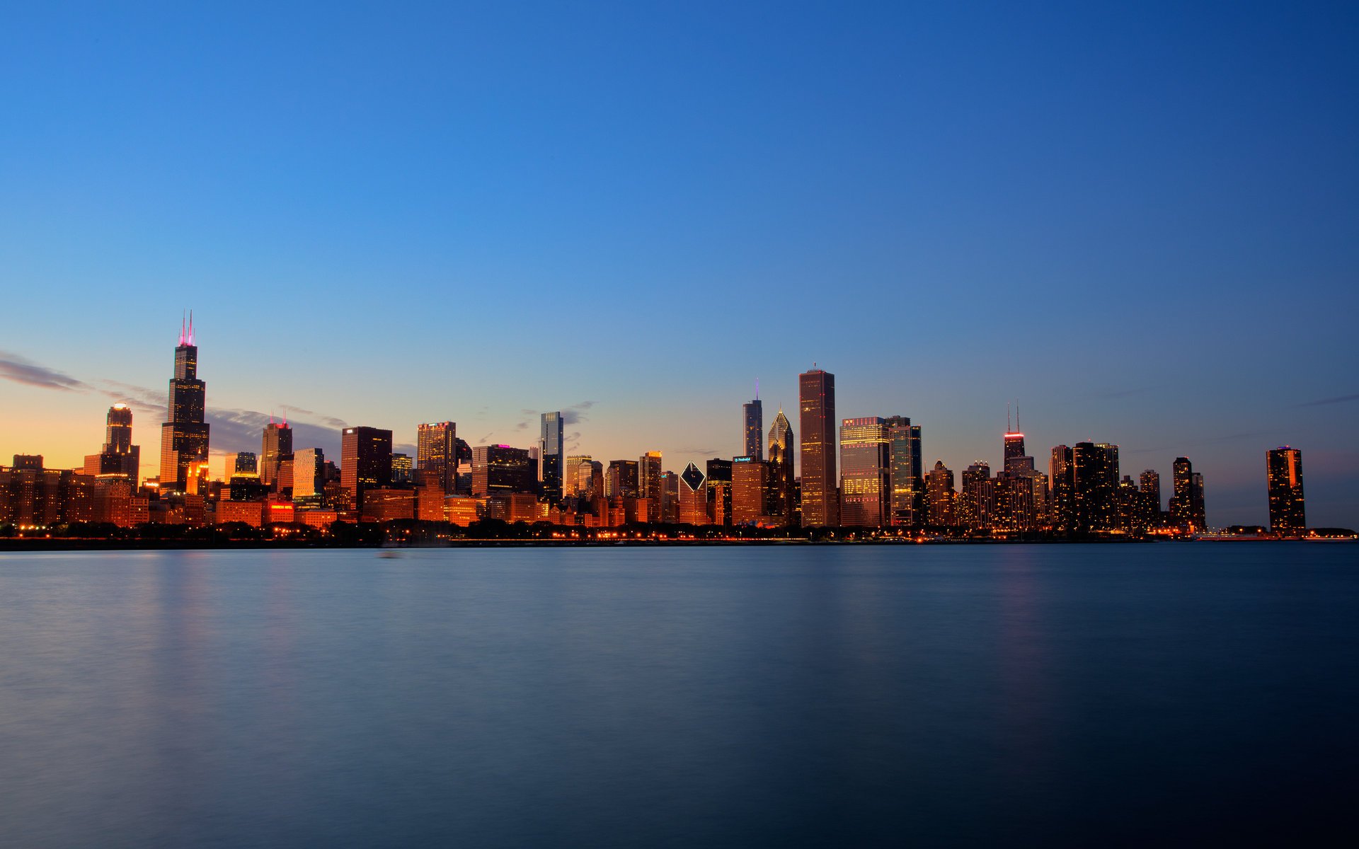 chicago maison lac coucher de soleil ciel eau bâtiments lumière ville