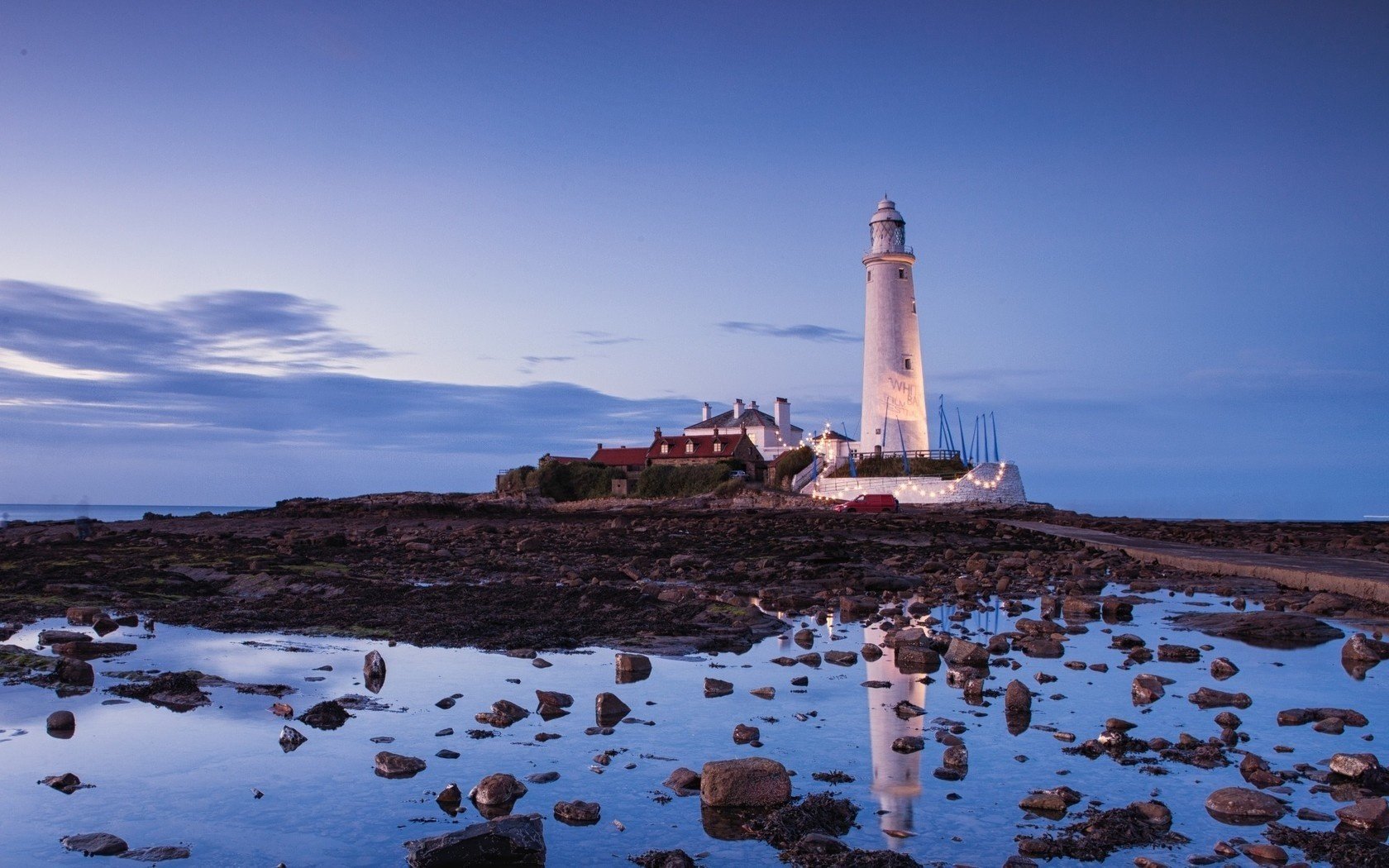 water stones lighthouse sea twilight