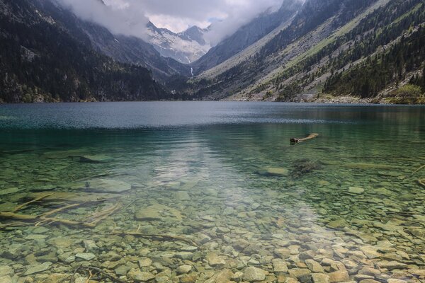 Transparent natural lake with rocks