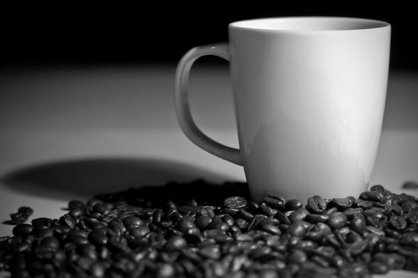 Black and white image of coffee and glass