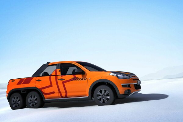 Pomarańczowy SUV na tle zimowych gór